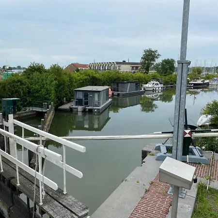 Modern House Boat In With Jetty