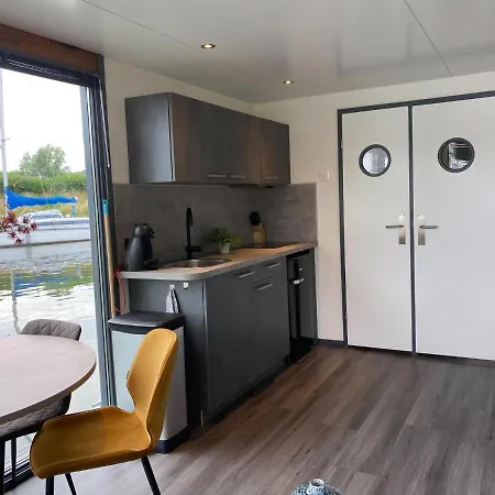 Botel Modern House Boat In With Jetty Monnickendam