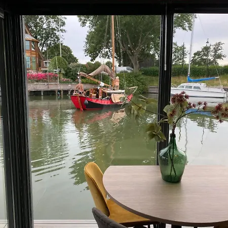 Modern House Boat In With Jetty