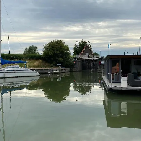 Botel Modern House Boat In With Jetty Monnickendam